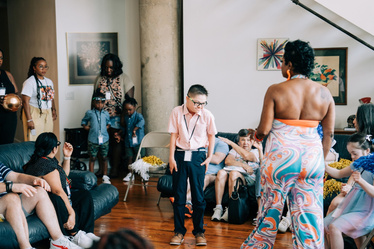 A mentor coaching a participant during rehearsal before the show